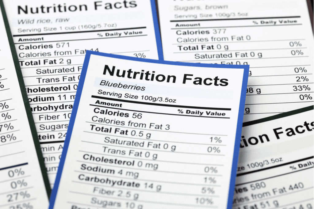 Multiple nutrition facts labels for different foods, including blueberries and wild rice
